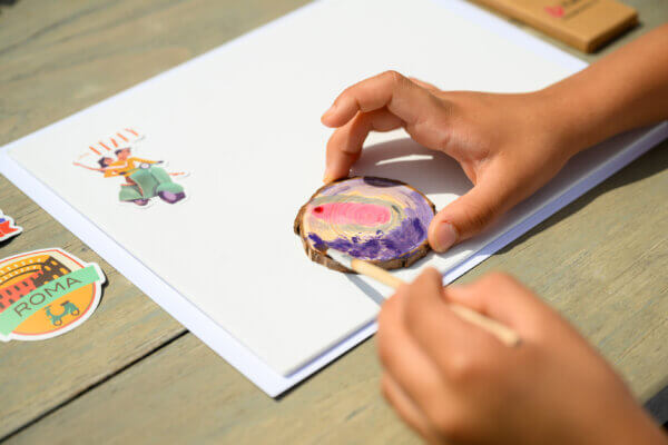 Child enjoying a creative travel activity while on vacation
